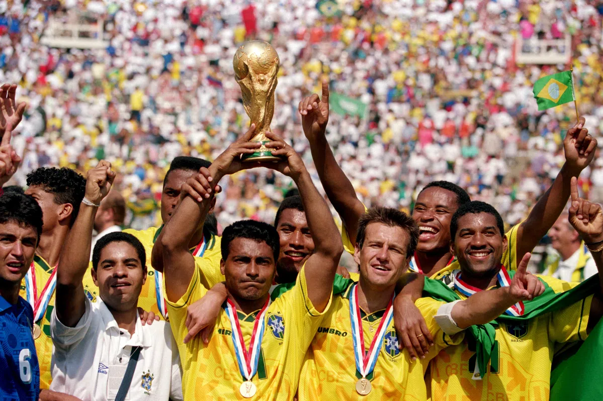 Brazil's national football team celebrating their 1994 World Cup victory on the field.