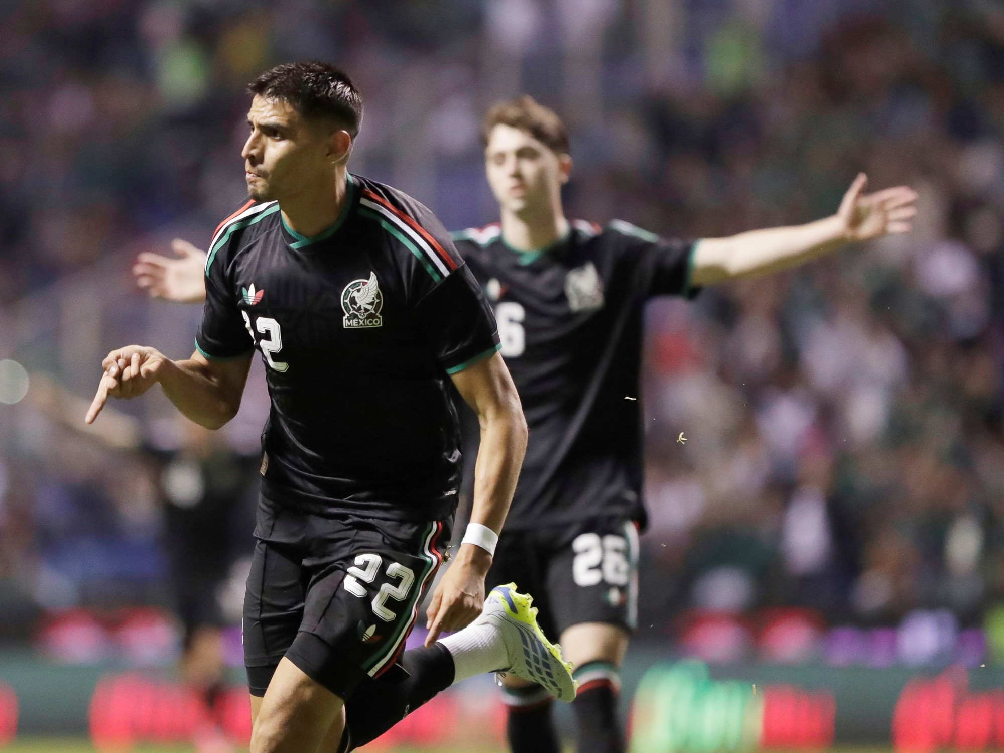 Mexico national football team players on the field during a match