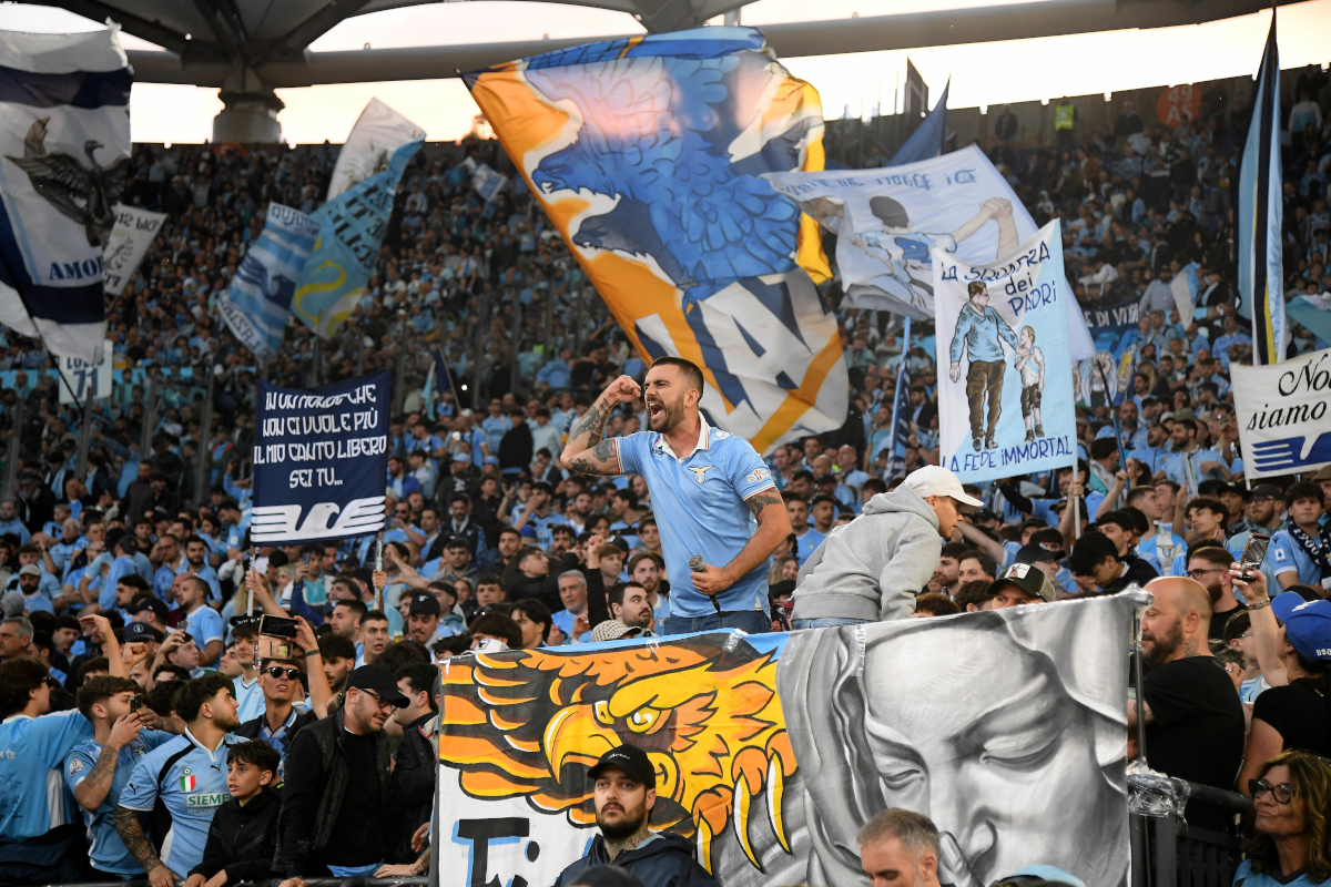 Lazio and Inter Milan fans unfurl large tifos in the stands of the Stadio Olimpico before the Coppa Italia Final.