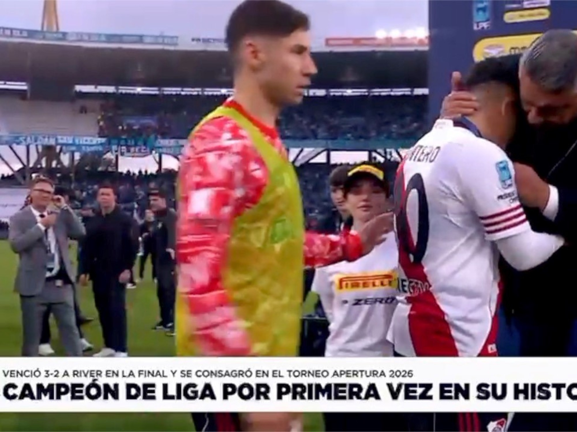 Gonzalo Montiel, wearing a River Plate kit, is seen on the field after a match.