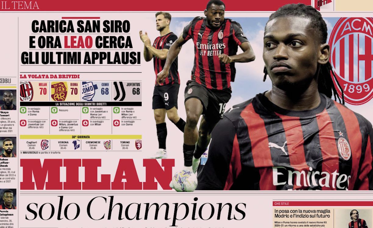 AC Milan players celebrating on the pitch at San Siro stadium