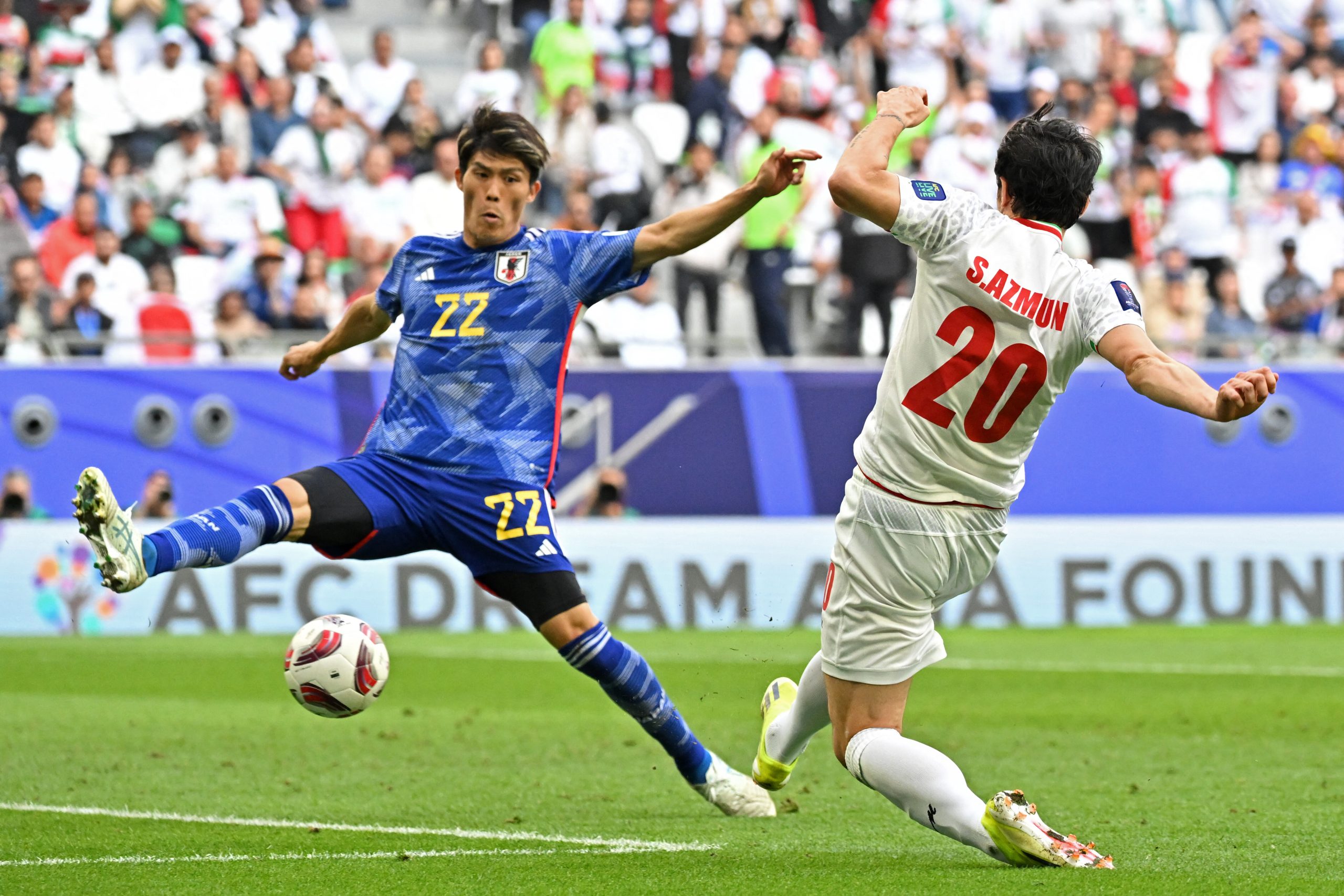 Takehiro Tomiyasu in action for the Japan national football team.