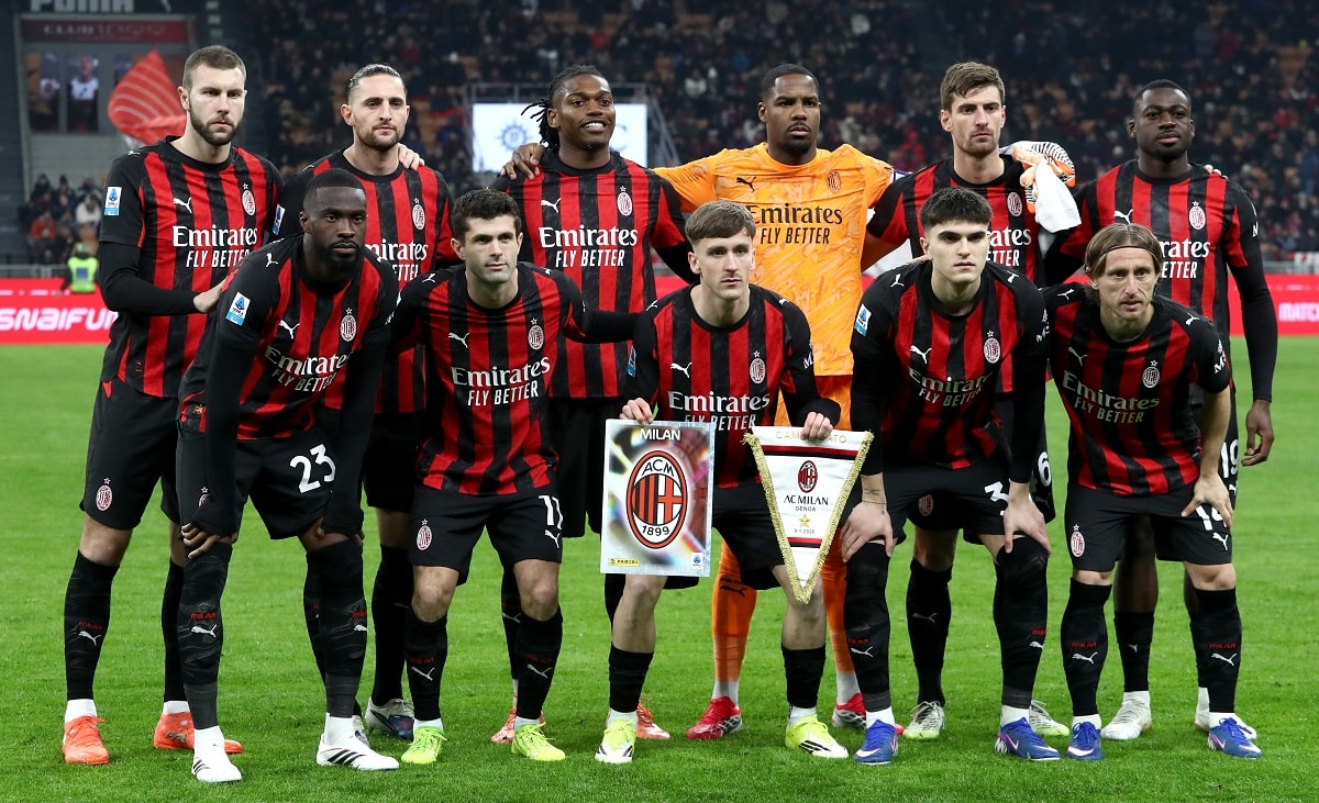 AC Milan and Genoa players in action during a Serie A match