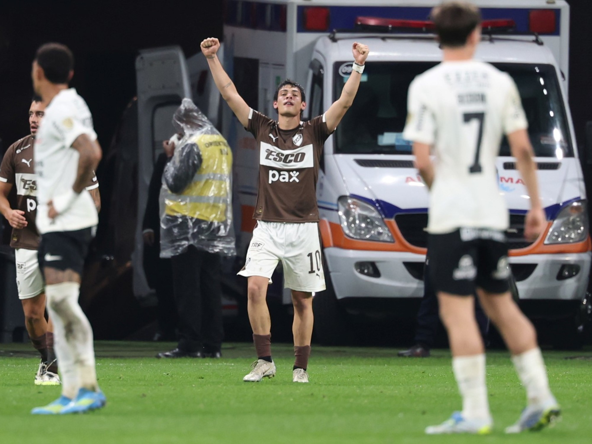 Platense players celebrating a goal on the field