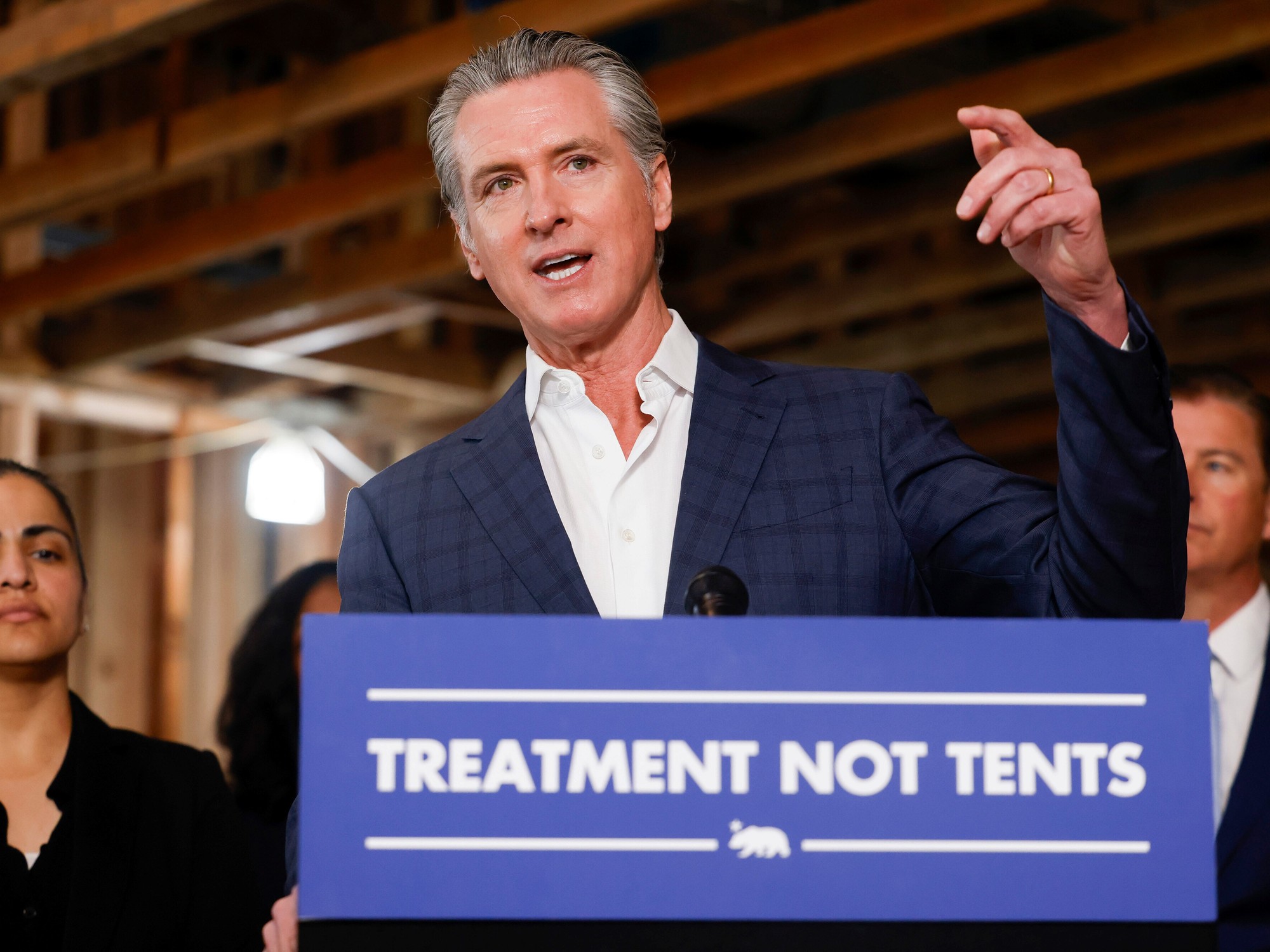 Governor Gavin Newsom speaking at an event related to clean energy initiatives in California.