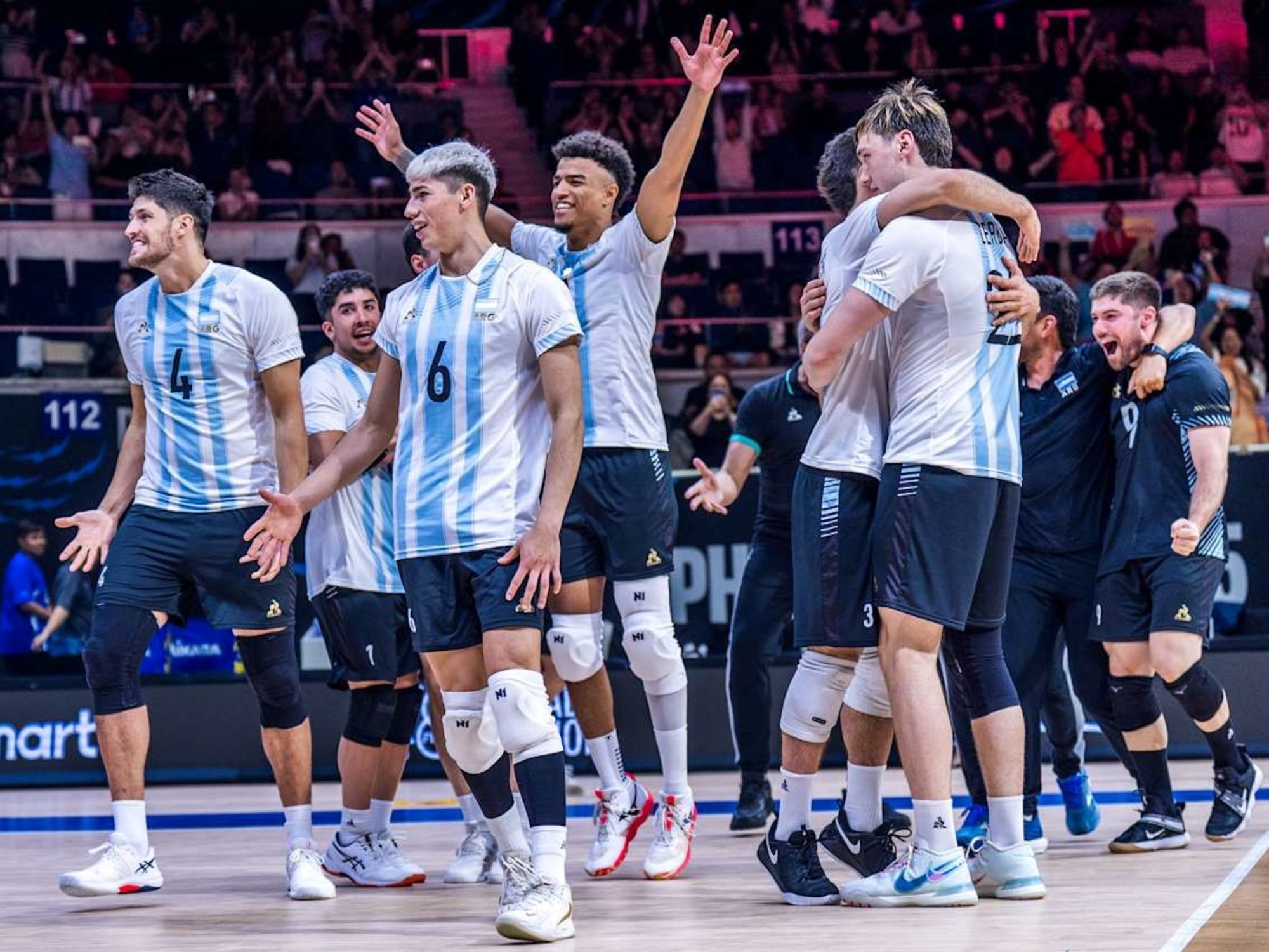 Members of the Argentine Men's Volleyball National Team competing in a match.