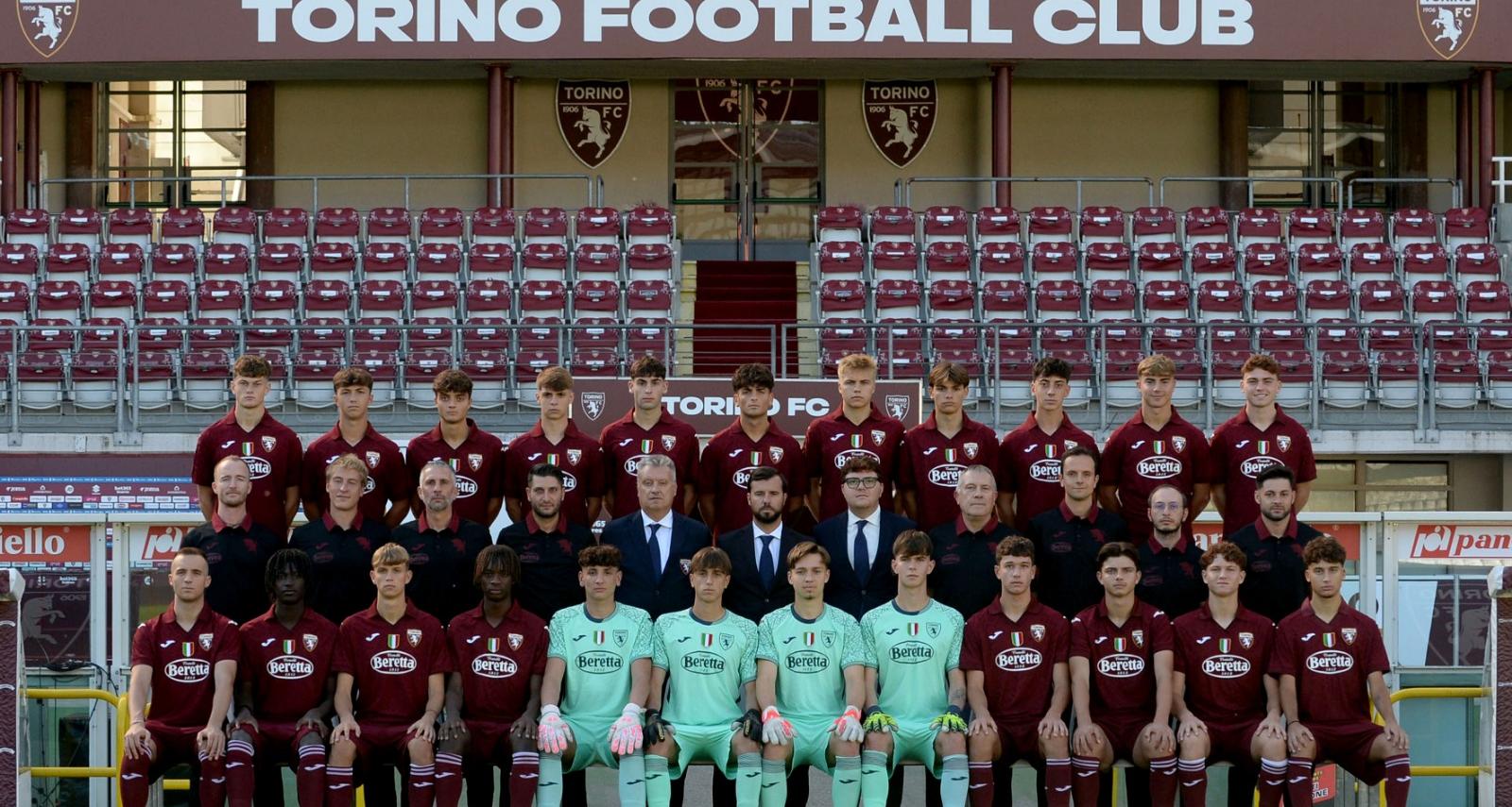 Torino players in action against Genoa during an Under-18 match.
