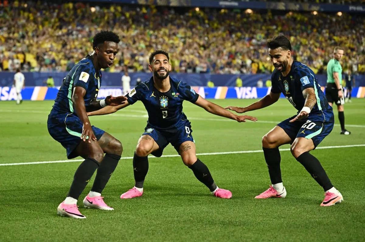 Brazil players celebrate a goal during their World Cup match against Haiti.