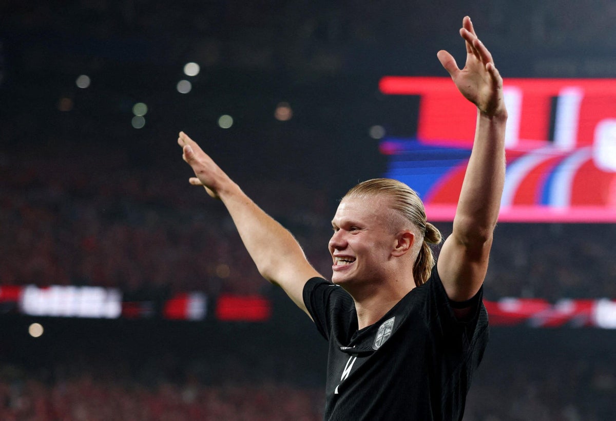 Erling Haaland celebrates scoring a goal for Norway during their World Cup match against Senegal.