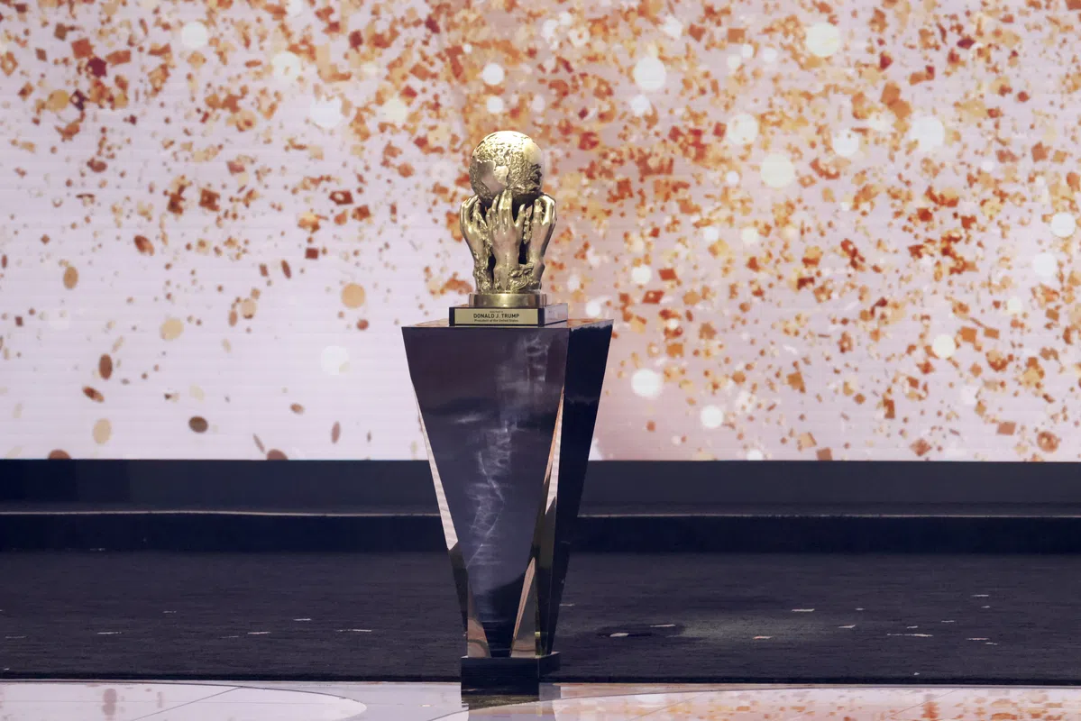 The FIFA World Cup trophy, symbolizing the tournament's prestige and the substantial prize money involved.