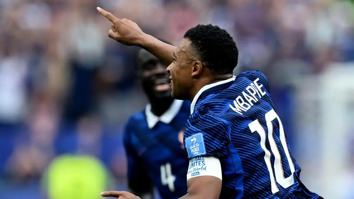 Mbappé Stars as France Defeats Iraq in Extended Match Delayed by Thunderstorm