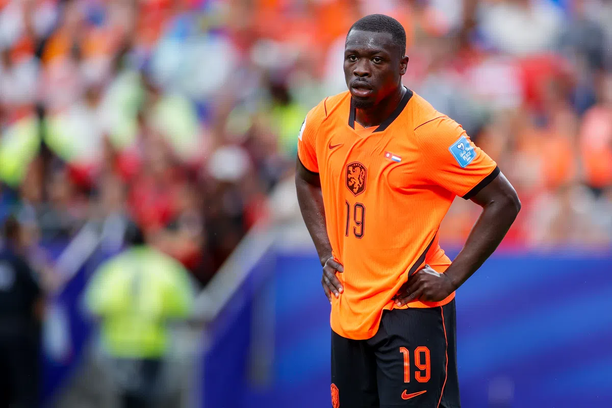 Brian Brobbey, Dutch national team striker, celebrating a goal during a World Cup match.