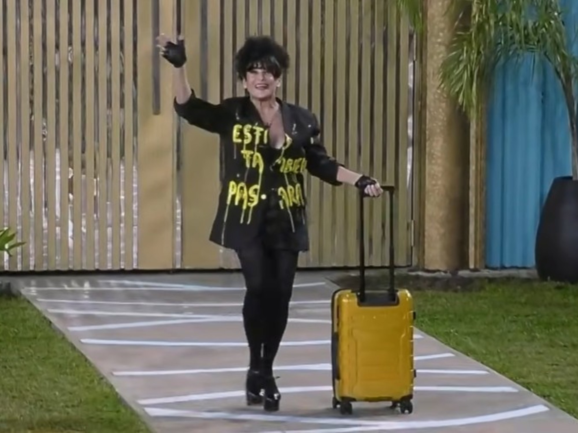 Actress Alejandra Majluf smiling as she enters the Gran Hermano house.