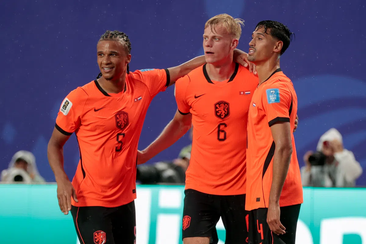 Dutch football players celebrating on the field
