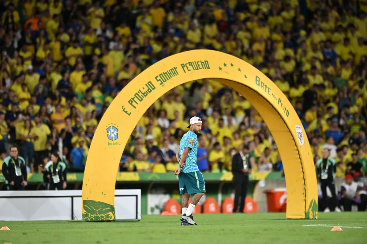 Brazil players celebrating a goal during a football match