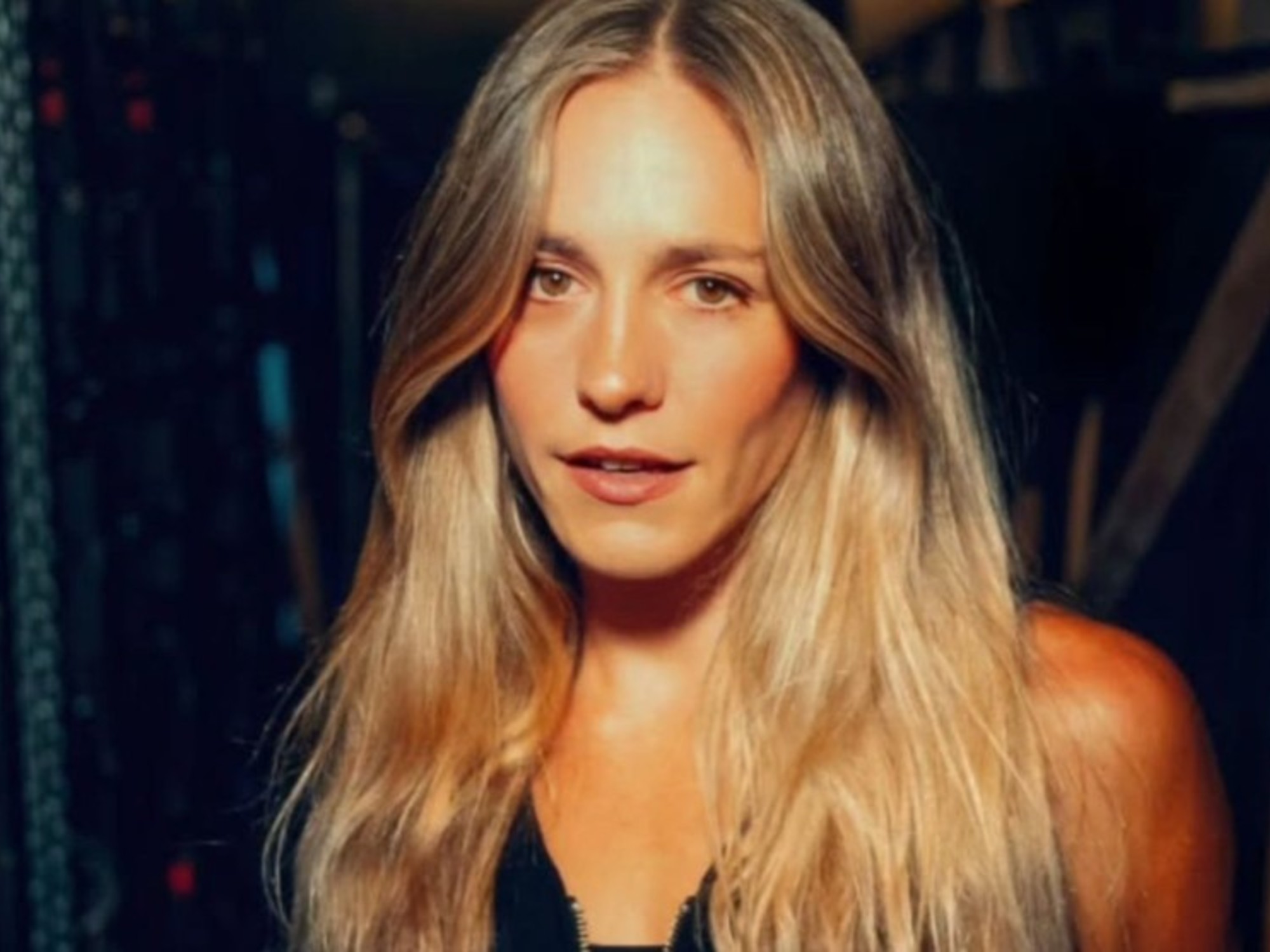 Actress Rocío Igarzábal speaking at an event, looking thoughtful.