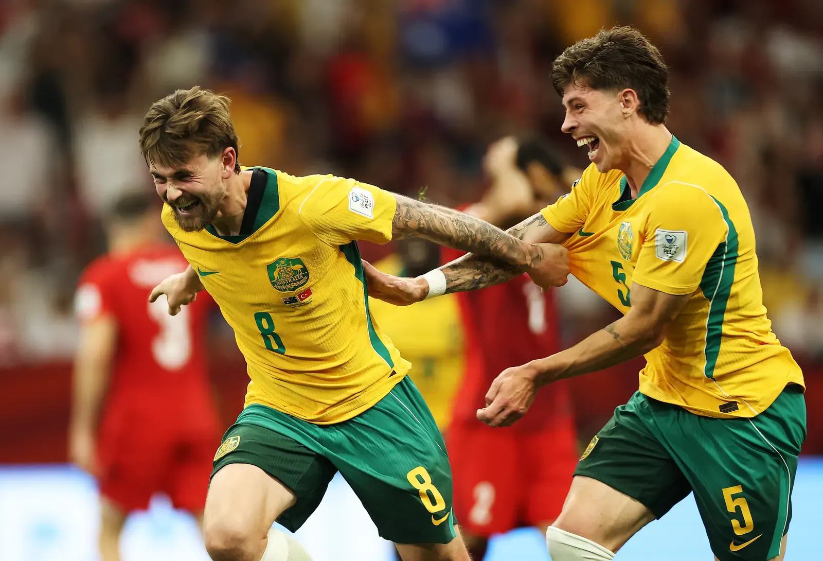 Australian players celebrate a goal against Turkiye during their FIFA World Cup 2026 Group D match.