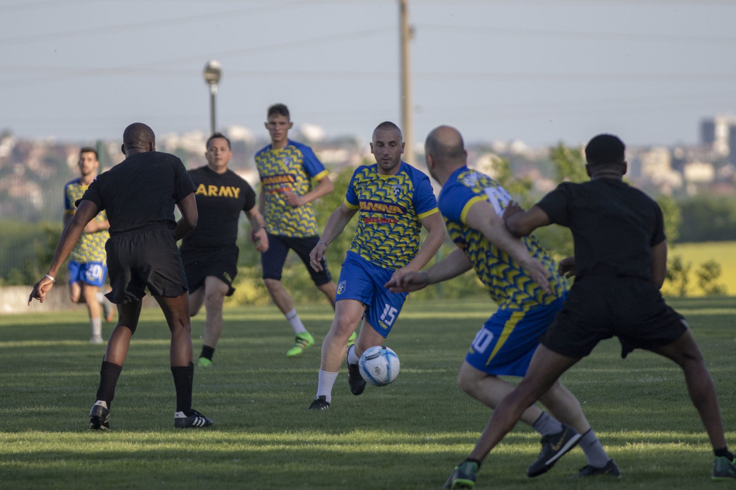 Soccer players in action during a competitive match