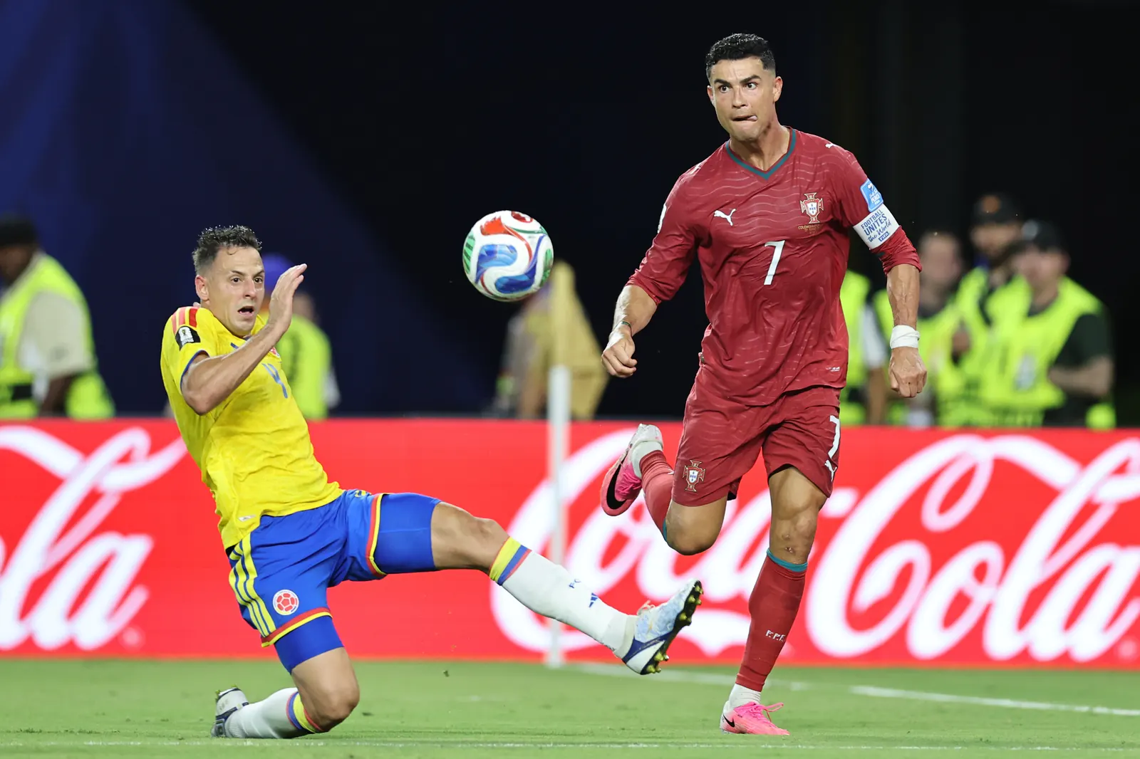 A football match in progress between Colombia and Portugal during the FIFA World Cup 2026.