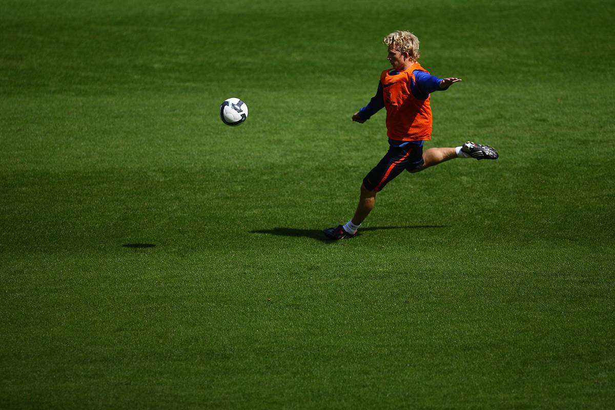 Players from the Netherlands national football team training on the pitch.