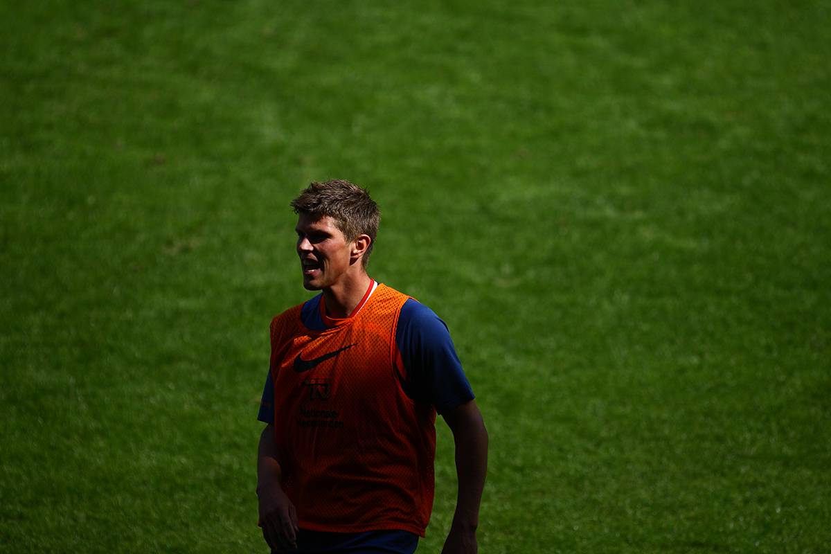 Players from the Netherlands national football team participating in a training drill.