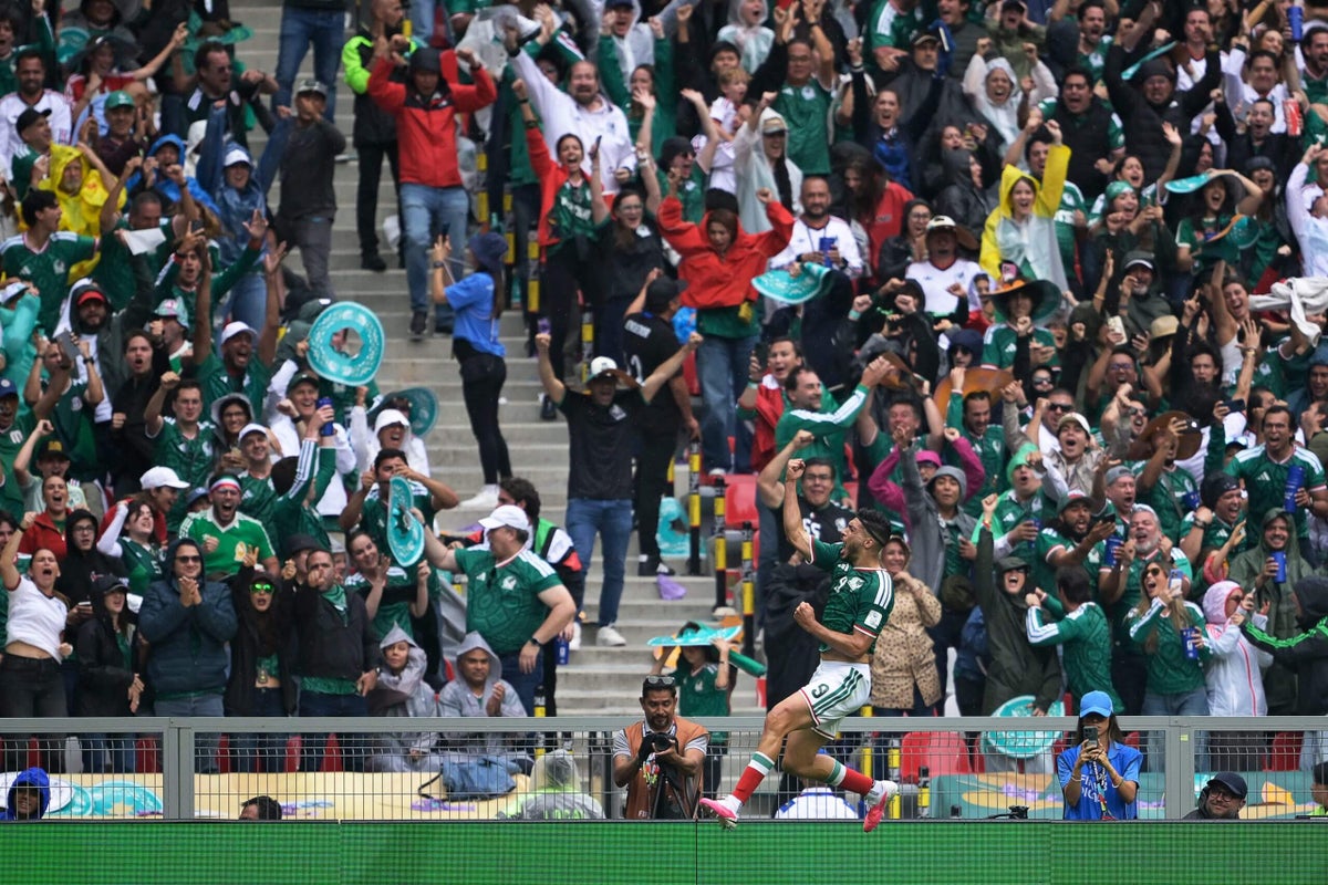 Fans celebrating a goal for Mexico during the 2026 World Cup opening match.