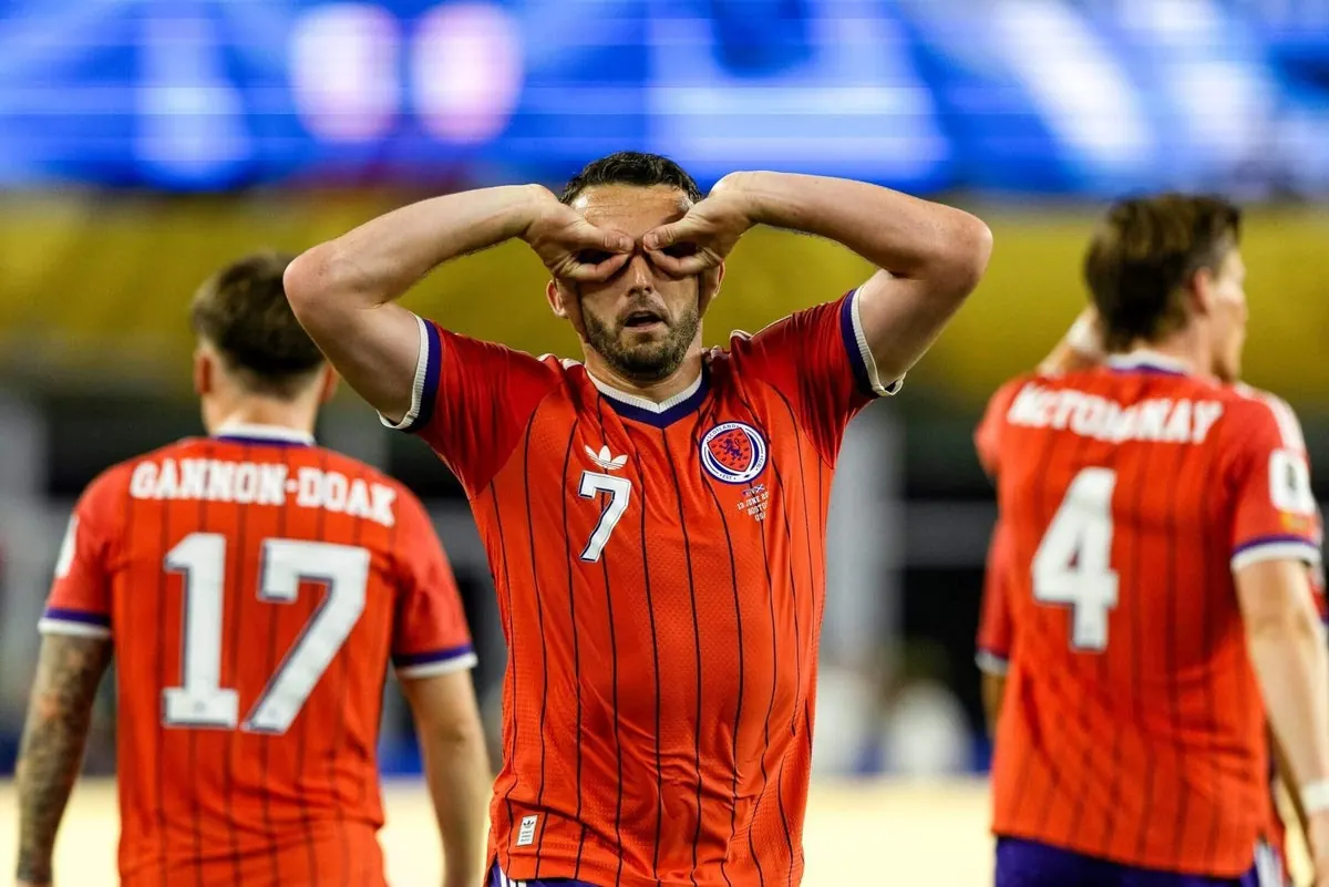 Scotland players celebrate a goal during their World Cup match against Haiti.