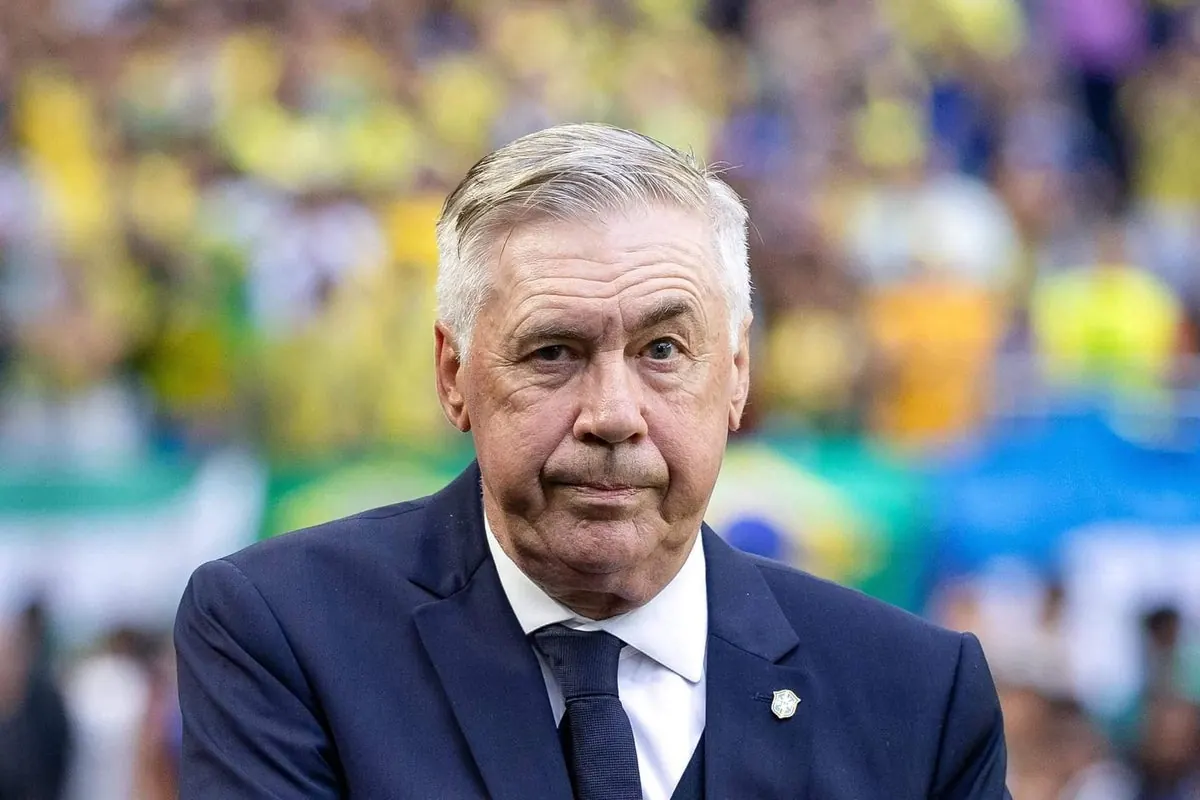 Carlo Ancelotti, manager of the Brazil national football team, in discussion with players on the sidelines.
