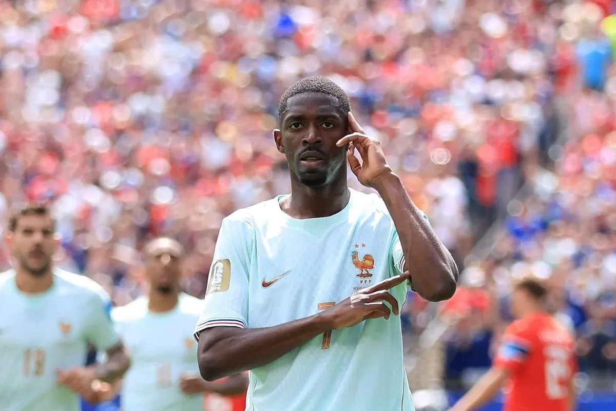 Ousmane Dembele of France celebrates scoring a goal during a World Cup match.