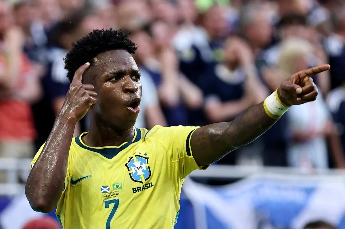 Vinicius Jr celebrates scoring for Brazil against Scotland in the 2026 World Cup.