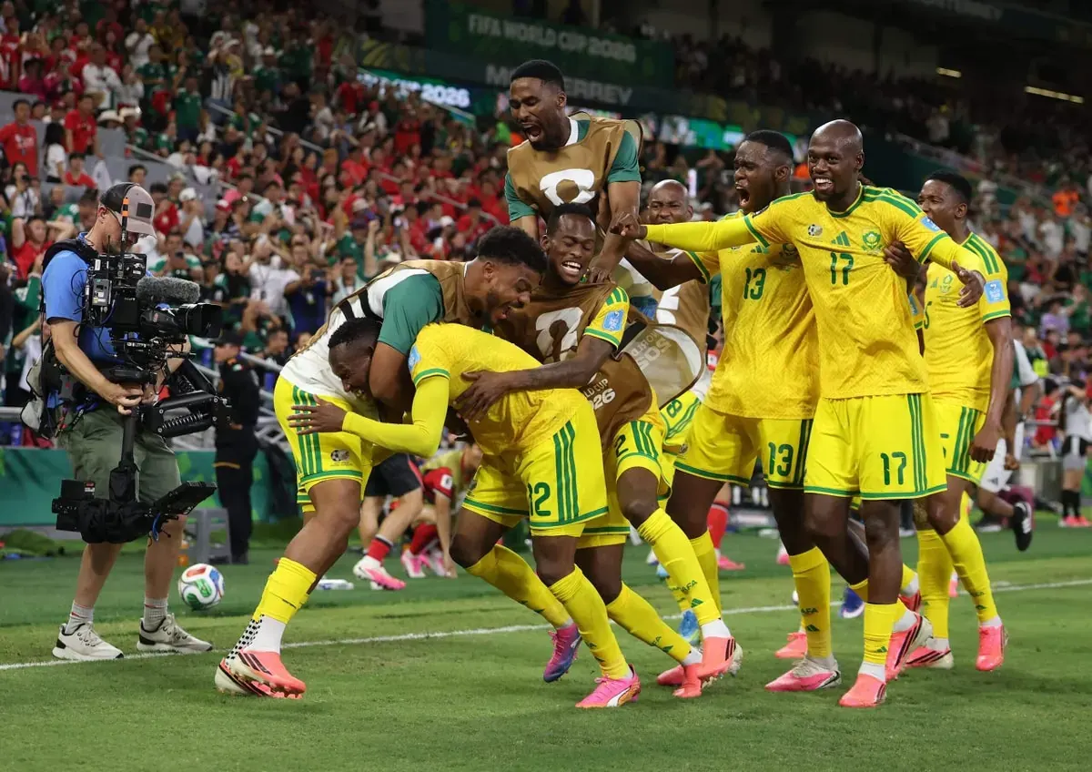Thapelo Maseko of South Africa celebrates scoring a goal with his teammates during the FIFA World Cup 2026 match against South Korea.
