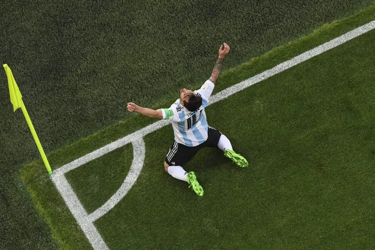 Lionel Messi celebrates scoring a goal for Argentina in a World Cup match.