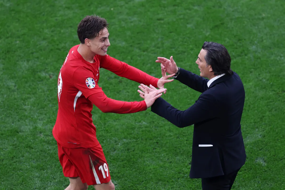 Kenan Yildiz of Turkey celebrating a disallowed goal during a UEFA EURO 2024 match.