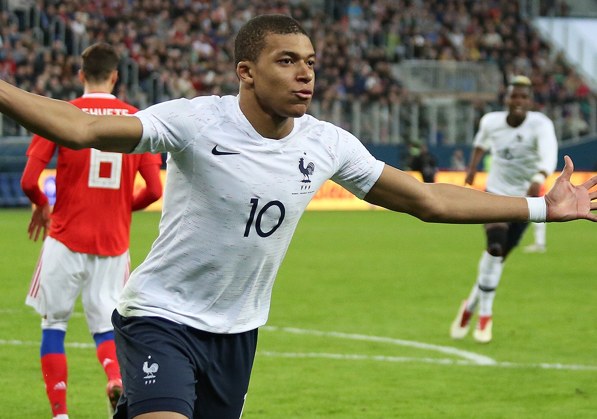 Kylian Mbappé in action for the French national football team.
