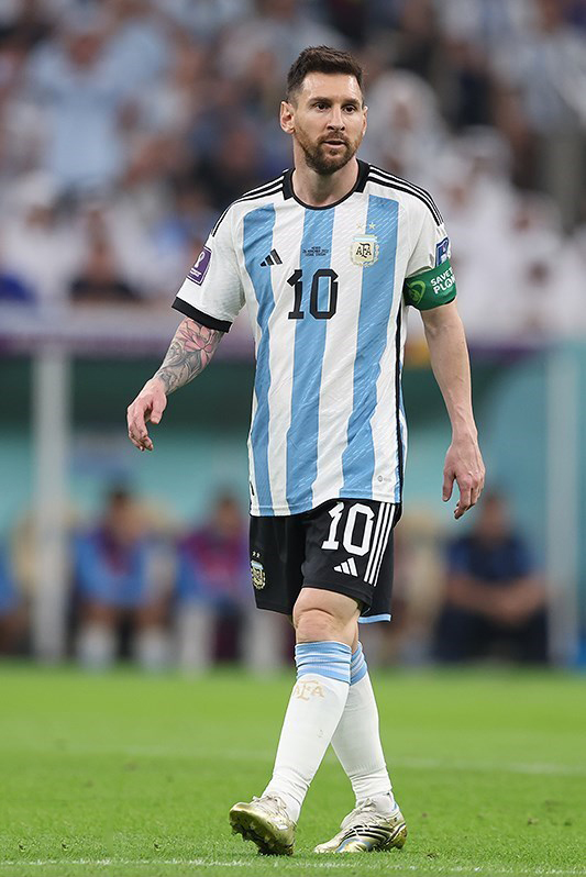 Lionel Messi in action for Argentina during a football match.