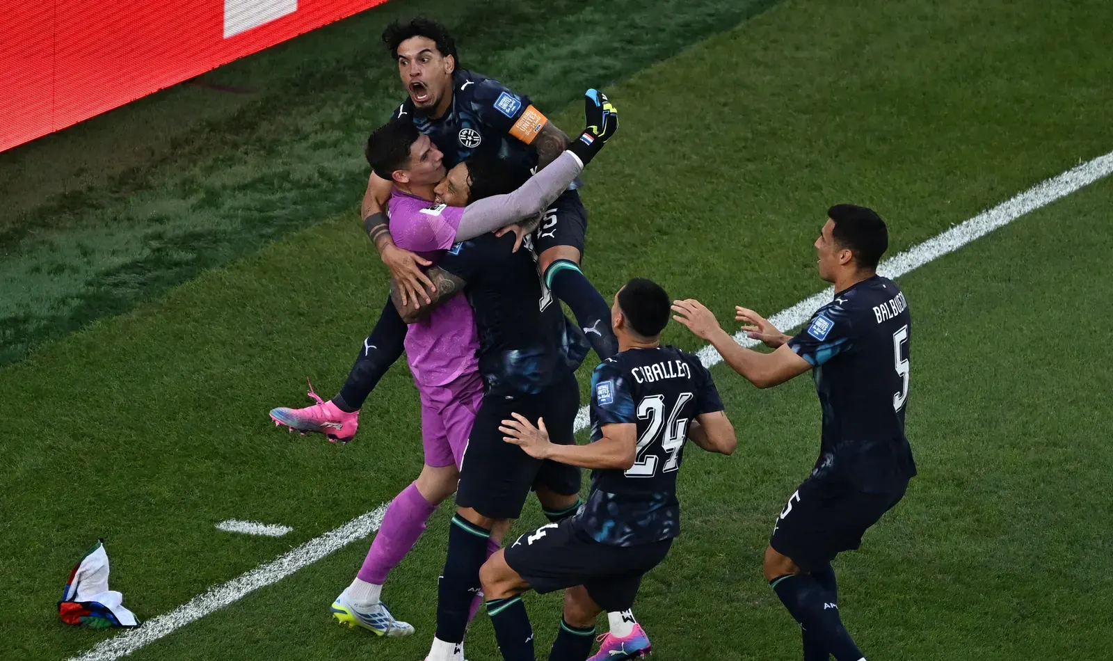 A dejected German player walks off the pitch after losing a penalty shootout to Paraguay in the FIFA World Cup 2026 Round of 32.