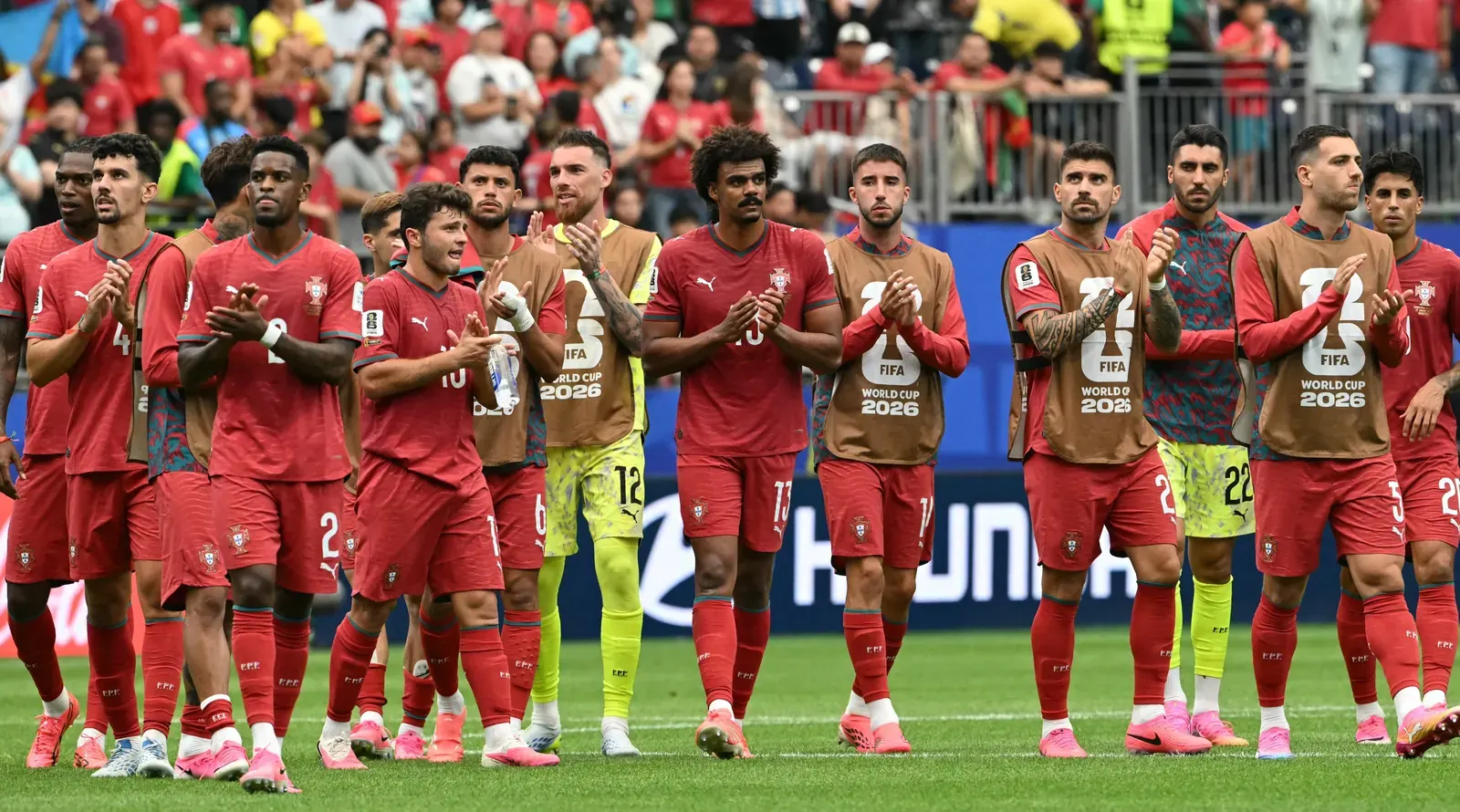 Football players in action during a FIFA World Cup 2026 match.