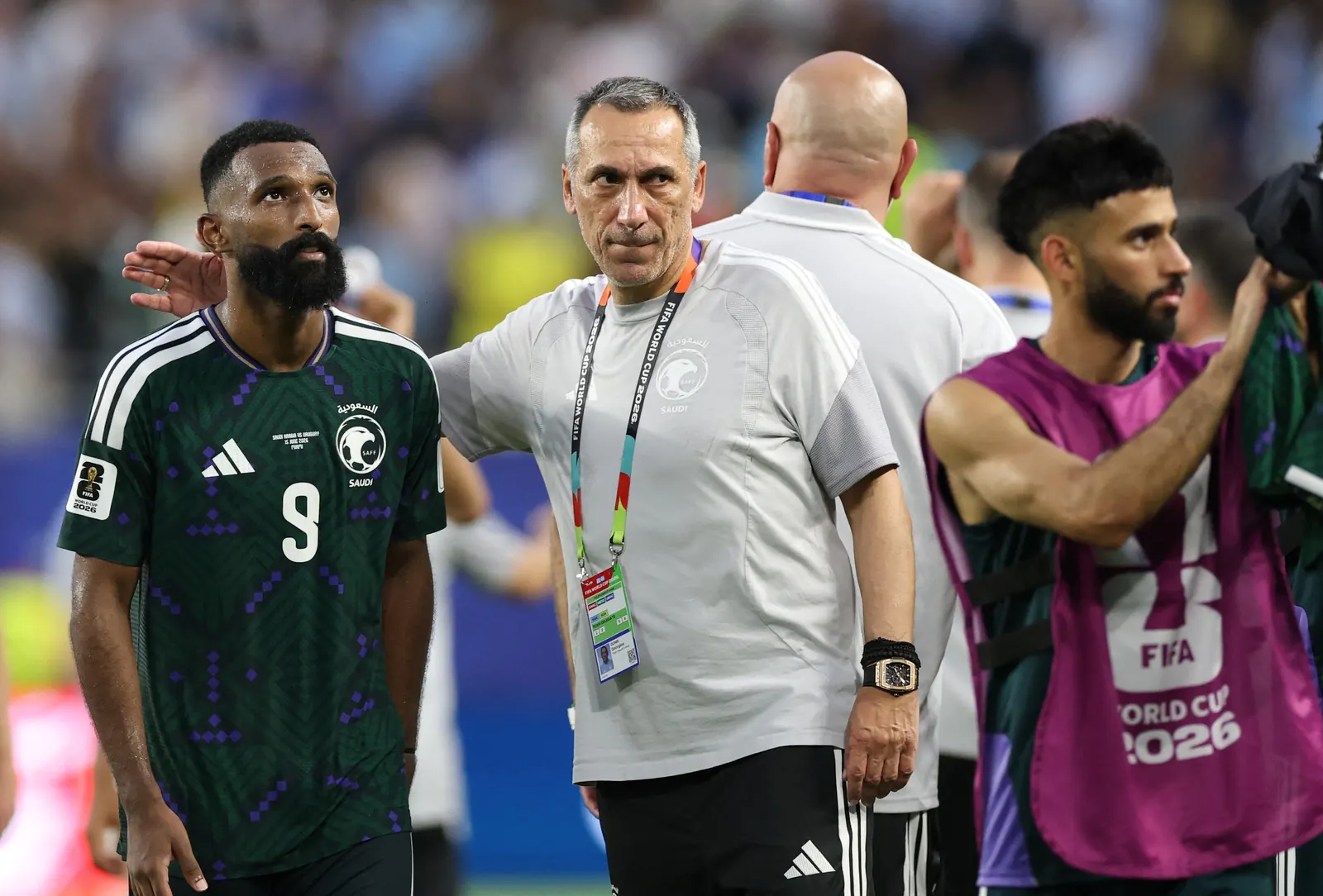Saudi Arabia players celebrating a defensive play during their FIFA World Cup 2026 match.