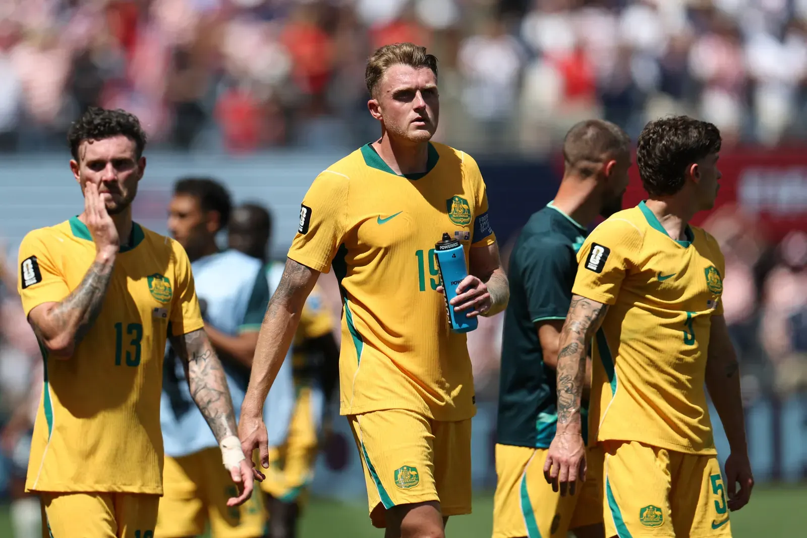 Australia and USA players in action during a FIFA World Cup 2026 match.