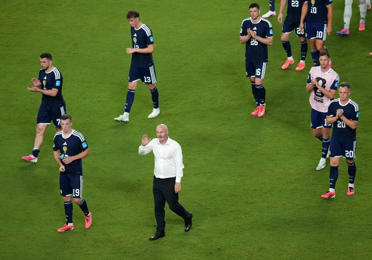 Scotland national football team players on the pitch during a World Cup match
