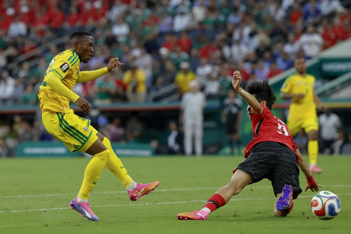South African player celebrating a goal against South Korea at the World Cup.