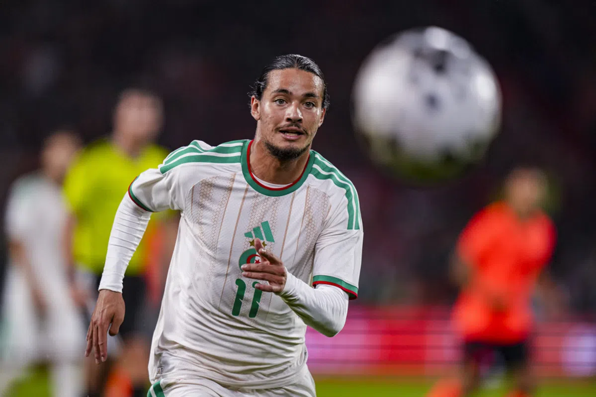 Algeria football players celebrating a goal during a match