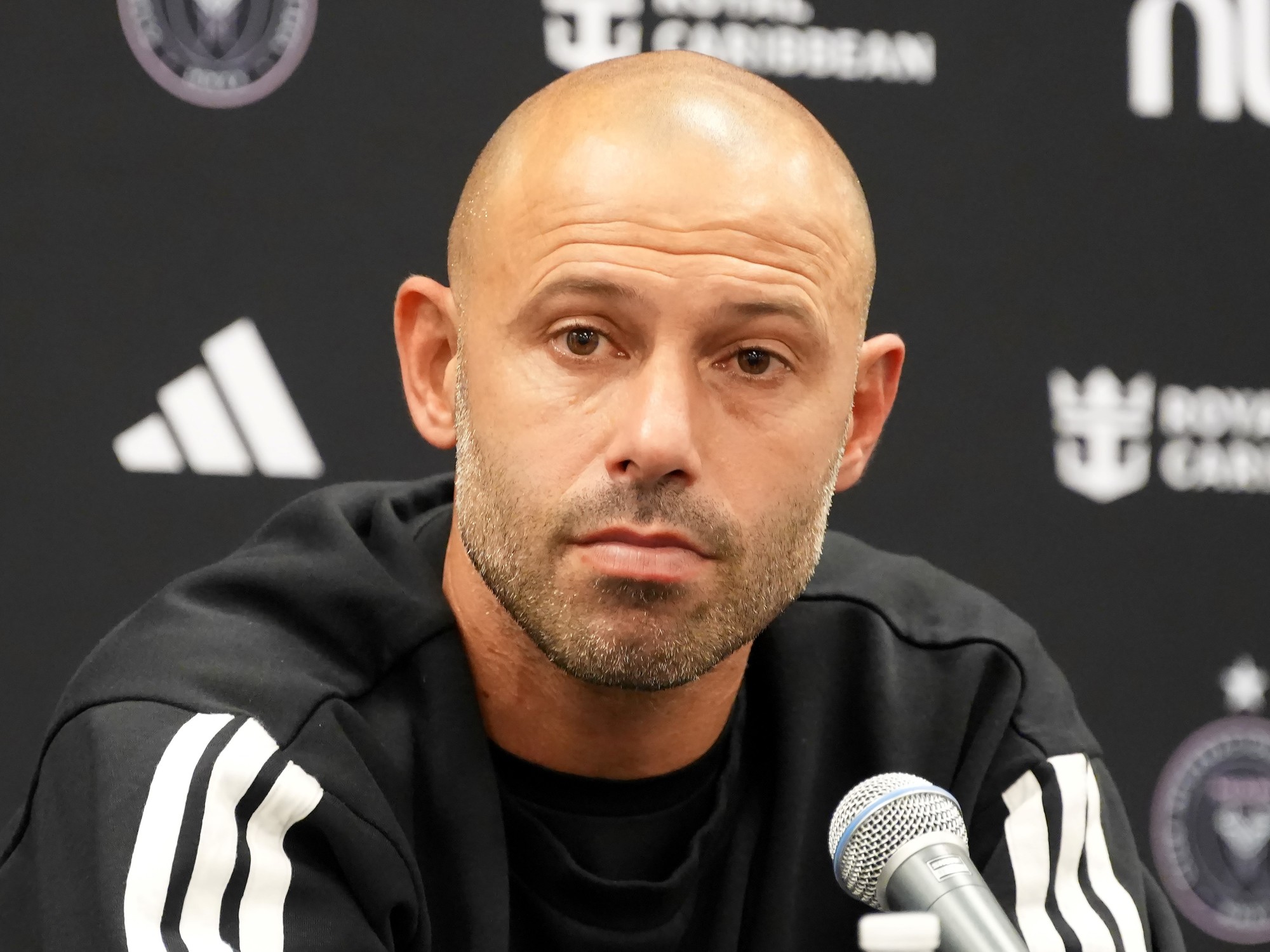 Javier Mascherano in a coaching capacity on the sidelines.