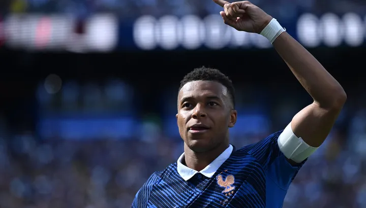Kylian Mbappe Stars as France Dominates Iraq to Secure World Cup Knockout Berth