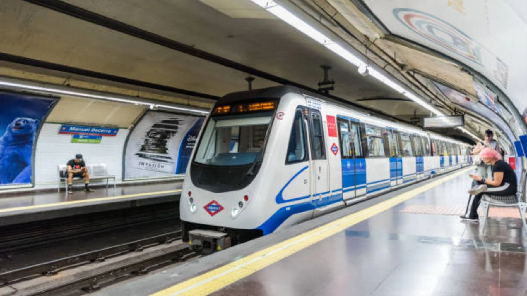 Panoramic view of Madrid, Spain, with public transportation visible.