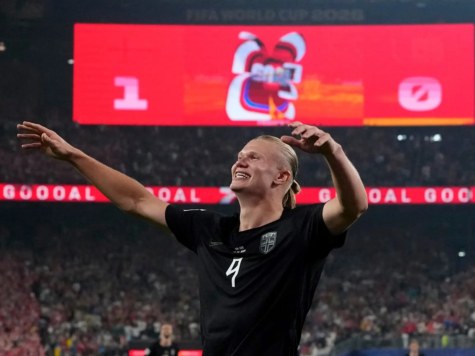 Erling Haaland celebrating a goal for Norway during a World Cup qualifier match