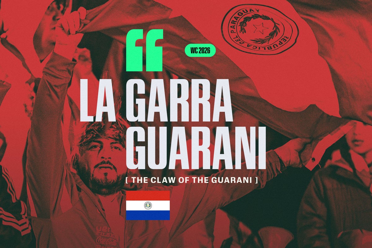 Enthusiastic Paraguayan football fans painted in red and white, waving flags and cheering.