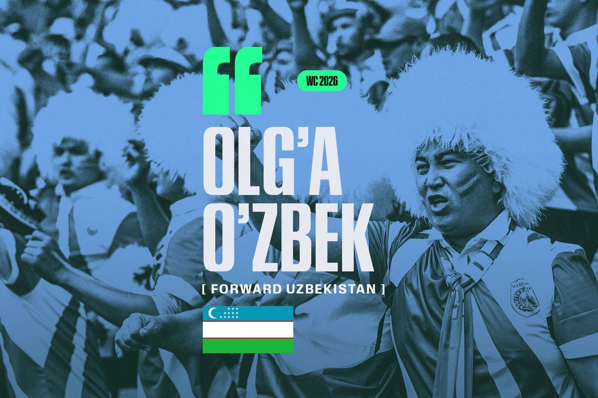 Uzbekistan national football team players celebrating a victory on the pitch.