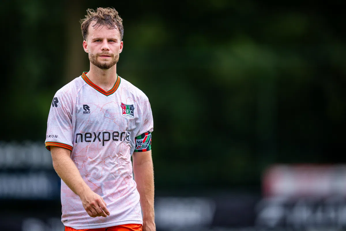 Dirk Proper in NEC kit during an Eredivisie match, midfield action
