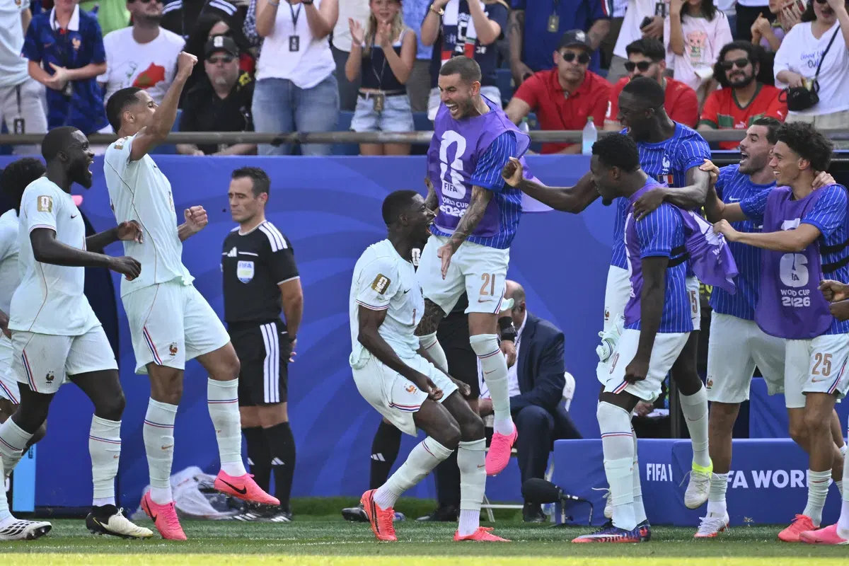 French football team celebrating a goal during a World Cup match